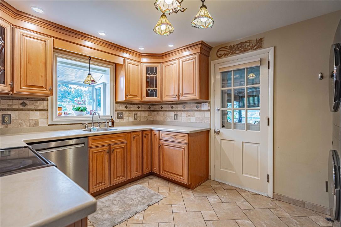 285 Bridle Path Road Bethlehem, PA 18017 - Photo 17 of 54 a kitchen with stainless steel appliances granite countertop a stove a sink and a refrigerator