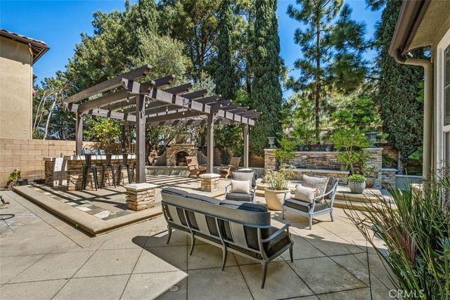 a view of a patio with swimming pool
