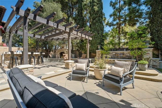 a view of yard with patio