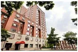 a room that has a bed and a window