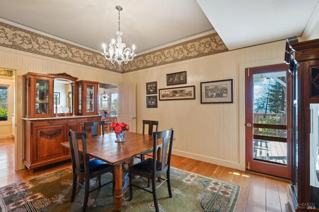 a bathroom with a sink toilet and shower a mirror