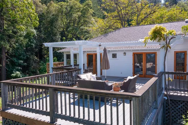 a bedroom with furniture and a book shelf