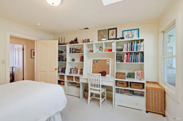 a bathroom with a sink a vanity and a mirror