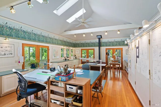 a view of a swimming pool with an outdoor seating