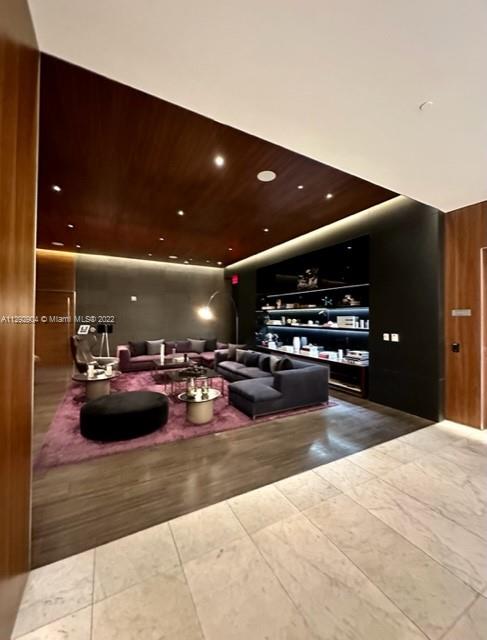 68 Southeast 6th Street, Unit 2507 Miami, FL 33131 - Photo 31 of 46 a view of a lobby with furniture