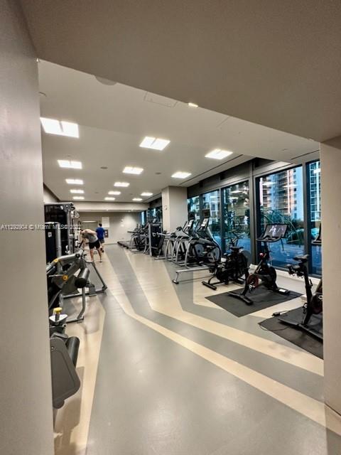 68 Southeast 6th Street, Unit 2507 Miami, FL 33131 - Photo 33 of 46 a view of a room with gym equipment