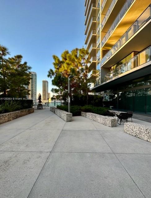 68 Southeast 6th Street, Unit 2507 Miami, FL 33131 - Photo 42 of 46 a view of street with parked cars