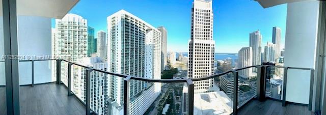 68 Southeast 6th Street, Unit 2507 Miami, FL 33131 - Photo 44 of 46 a view of a balcony with stairs