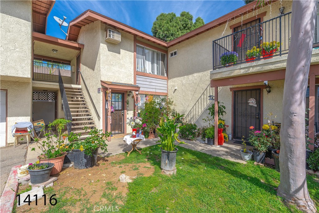 14116 Rondeau Street Westminster, CA 92683 - Photo 9 of 16 a front view of a house with a yard