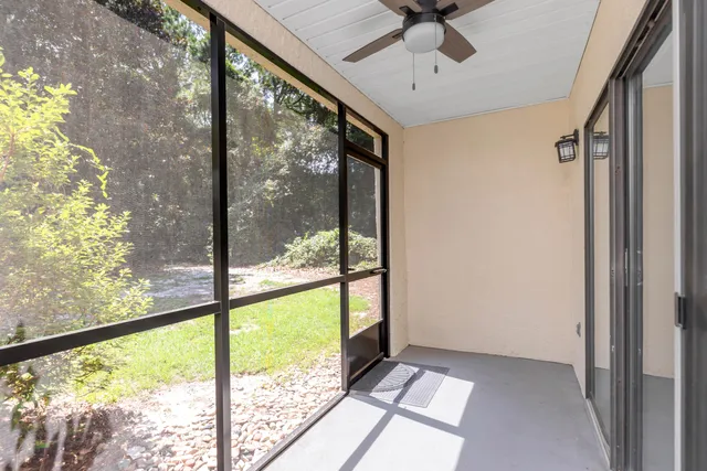 a bedroom with furniture and a chandelier