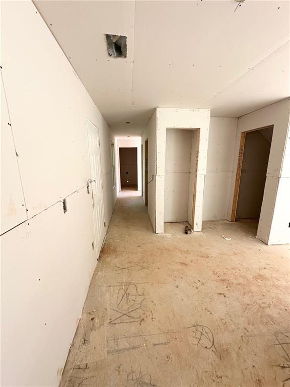 115 Deer Crossing Temple, GA 30179 - Photo 12 of 27 a view of a hallway with wooden floor and cabinet