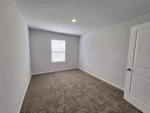 115 Deer Crossing Temple, GA 30179 - Photo 24 of 27 an empty room with a window