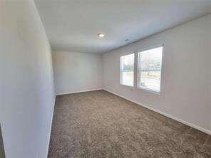 115 Deer Crossing Temple, GA 30179 - Photo 26 of 27 an empty room with windows