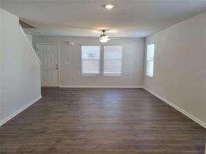 115 Deer Crossing Temple, GA 30179 - Photo 7 of 27 wooden floor in an empty room with a window