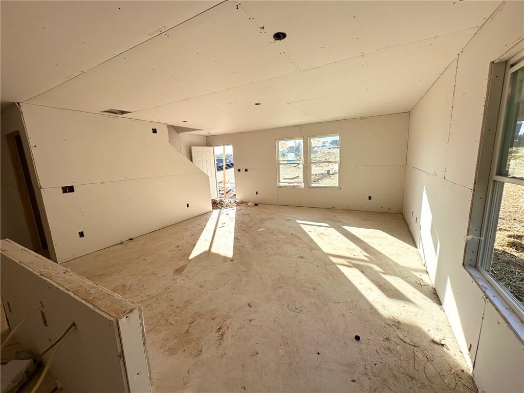 115 Deer Crossing Temple, GA 30179 - Photo 8 of 27 a view of a kitchen with a sink and a window