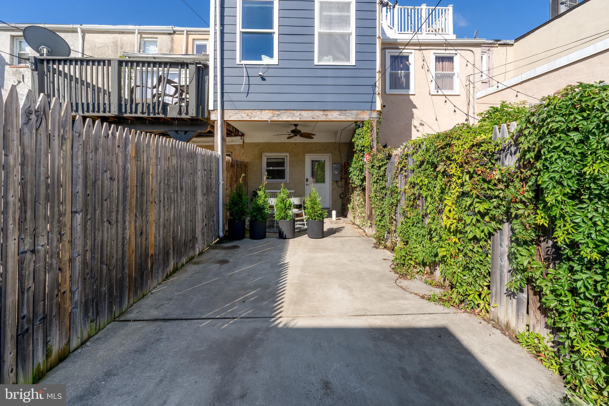 23 South Washington Street Baltimore, MD 21231 - Photo 12 of 57 a view of a house with a small yard and wooden floor