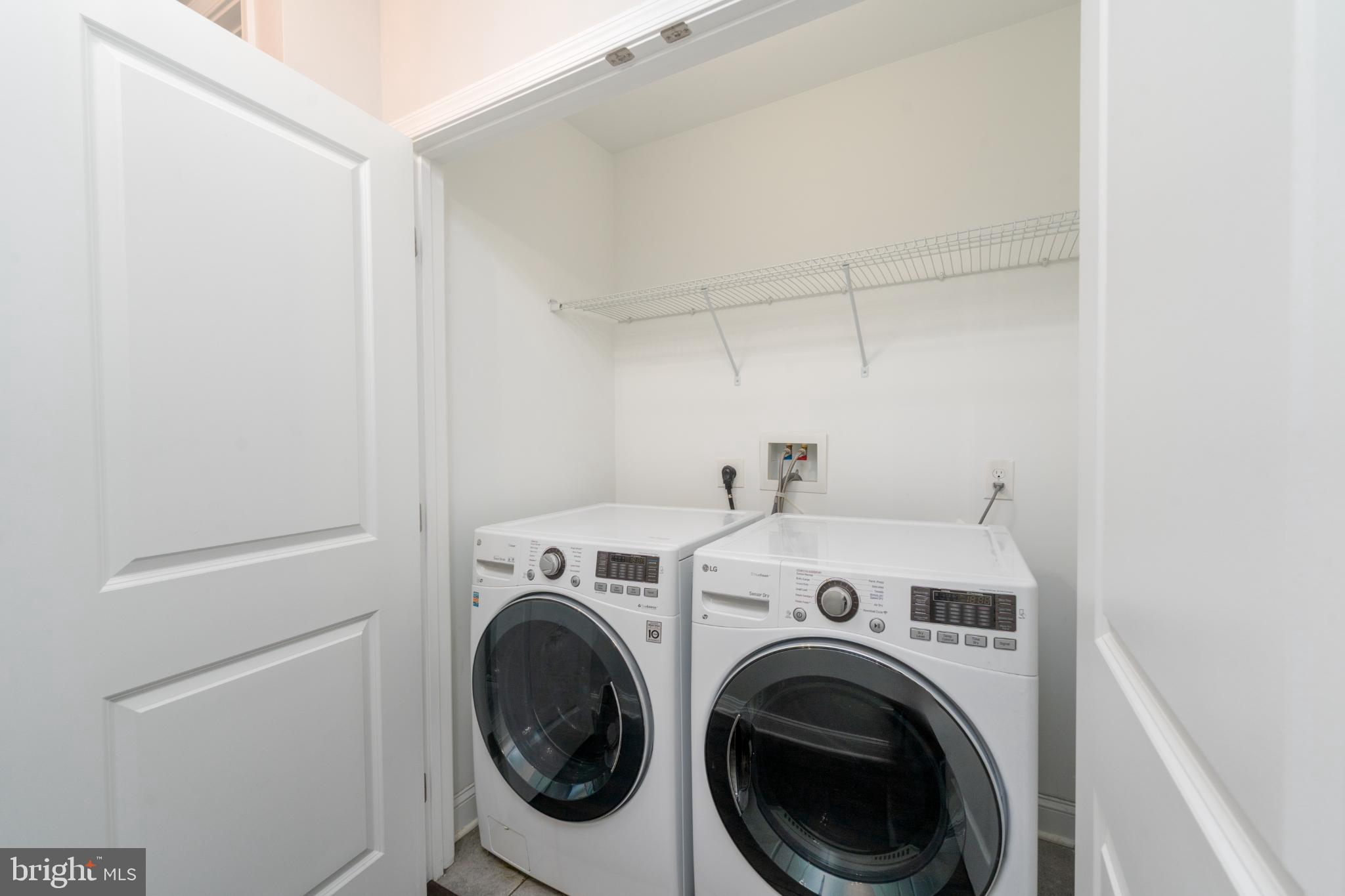 23 South Washington Street Baltimore, MD 21231 - Photo 17 of 57 a utility room with dryer and washer