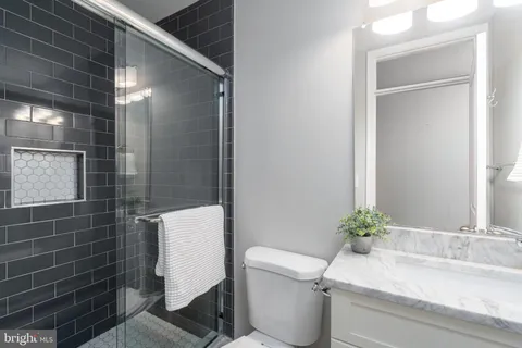 a picture of a bench in a room