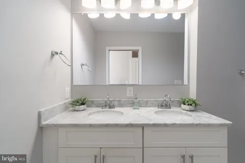 a bathroom with a shower and a toilet