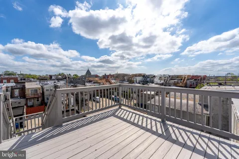 a view of city from a roof deck