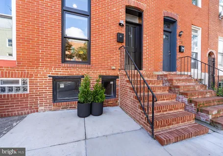 a view of a terrace with chairs