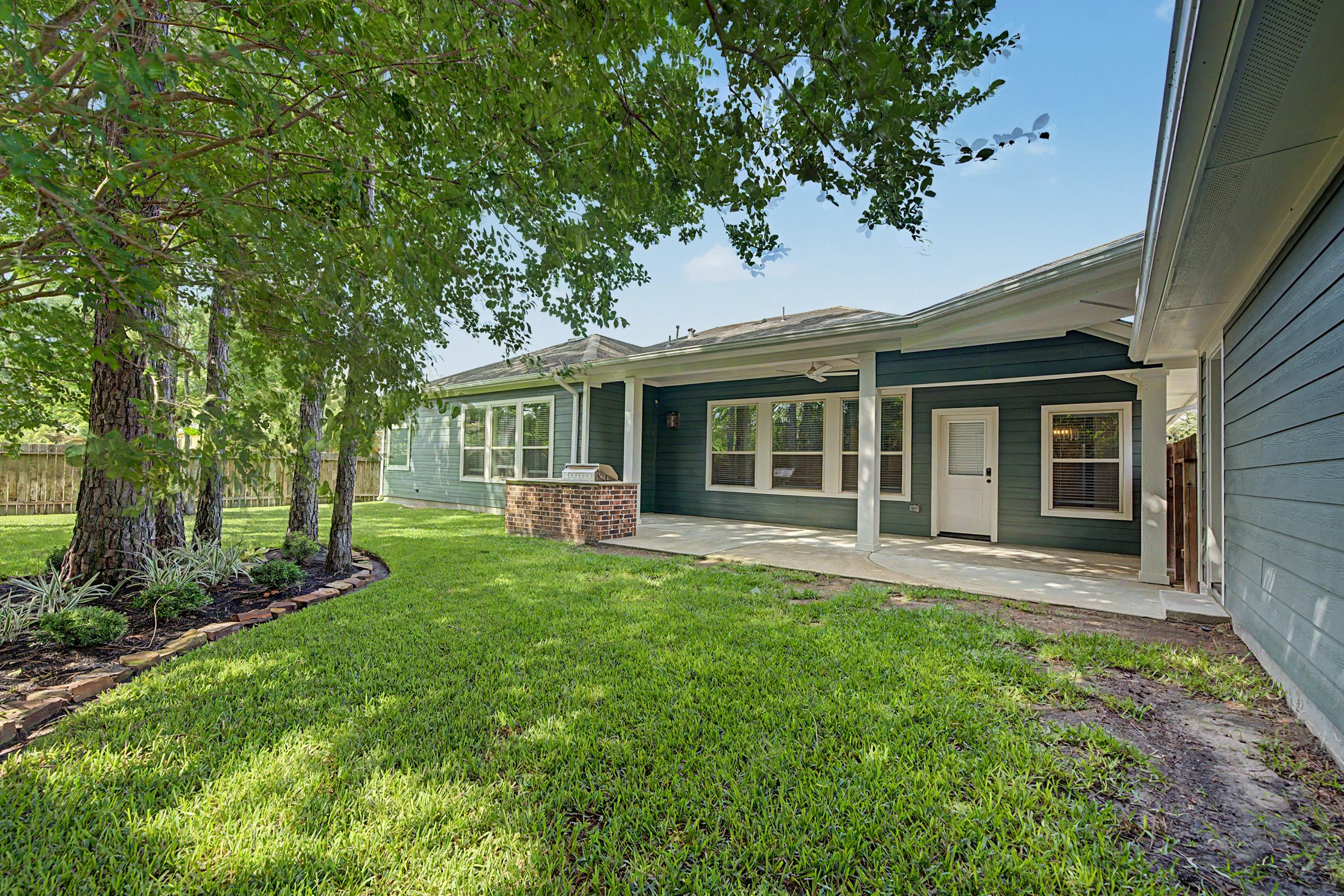 31032 Sunfall Trail Lane Spring, TX 77386 - Photo 27 of 39 front view of a house with a yard