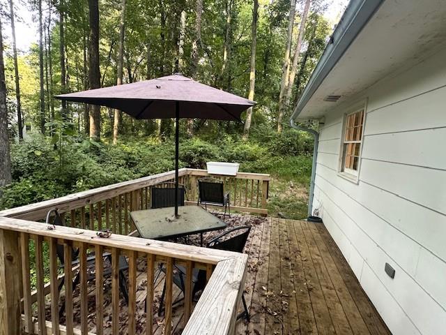 4073 Twin Springs Road Gainesville, GA 30507 - Photo 17 of 41 a view of balcony with two chairs and wooden fence