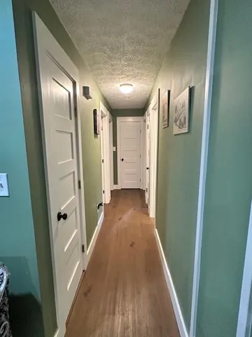 a view of hallway with stairs