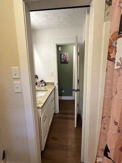 4073 Twin Springs Road Gainesville, GA 30507 - Photo 31 of 41 a bathroom with a granite countertop sink a mirror and a shower