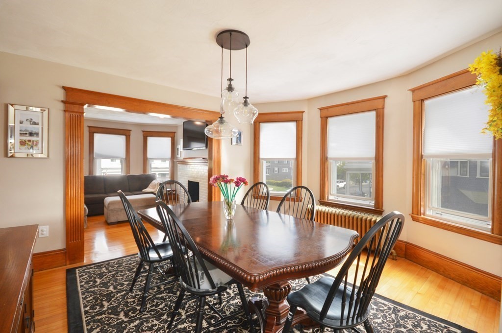 183 Cottage Park Road Winthrop, MA 02152 - Photo 18 of 35 a view of a dining room with furniture window and wooden floor