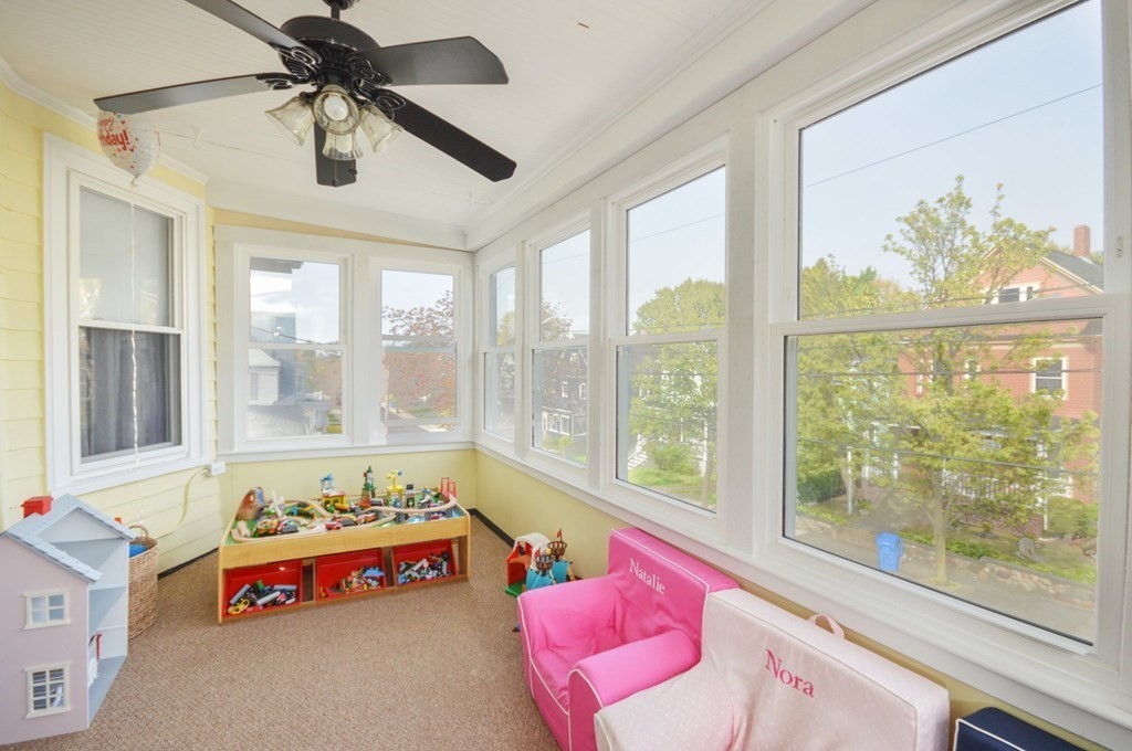 183 Cottage Park Road Winthrop, MA 02152 - Photo 22 of 35 a bedroom with furniture and large windows