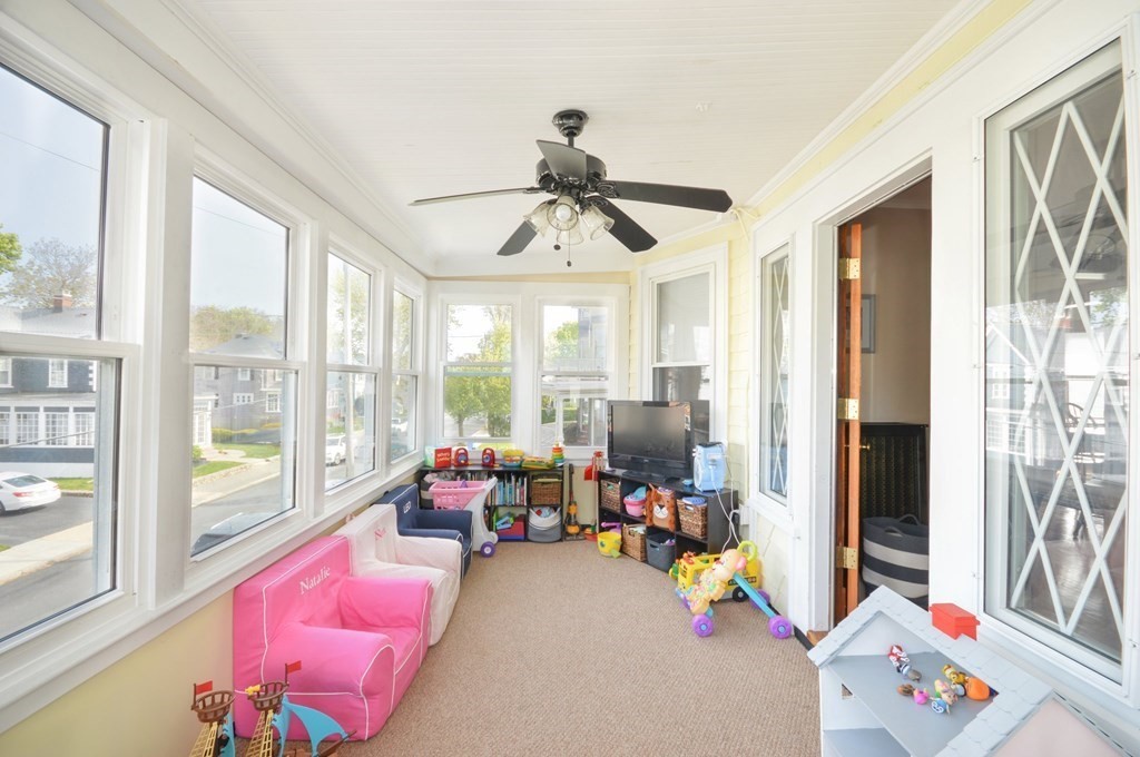 183 Cottage Park Road Winthrop, MA 02152 - Photo 23 of 35 a bedroom with furniture and a large window