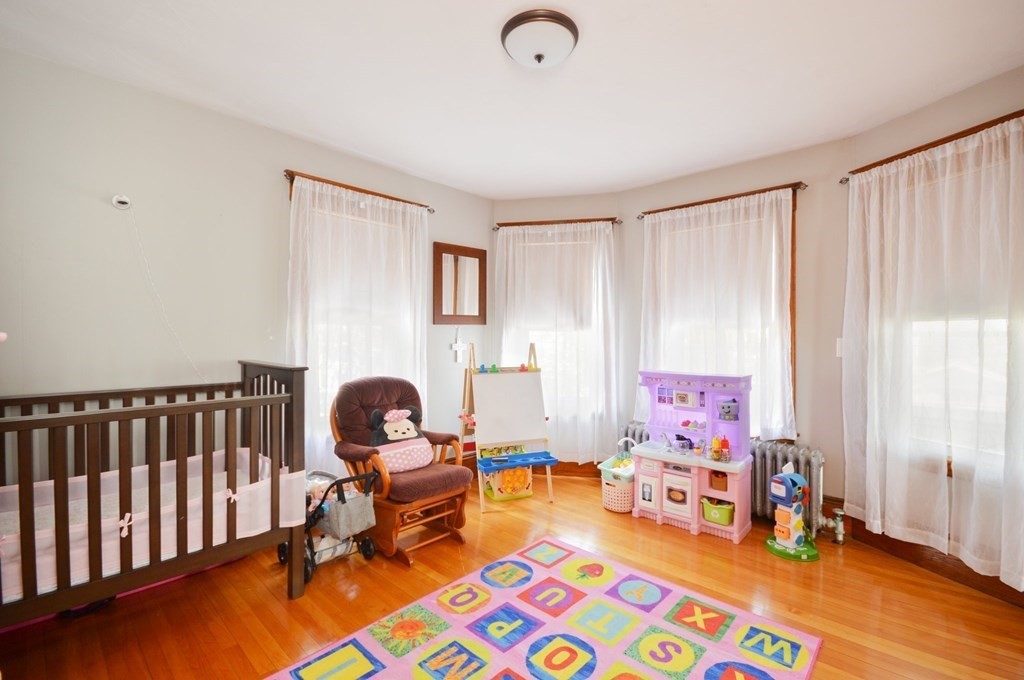 183 Cottage Park Road Winthrop, MA 02152 - Photo 24 of 35 a living room with furniture and a window