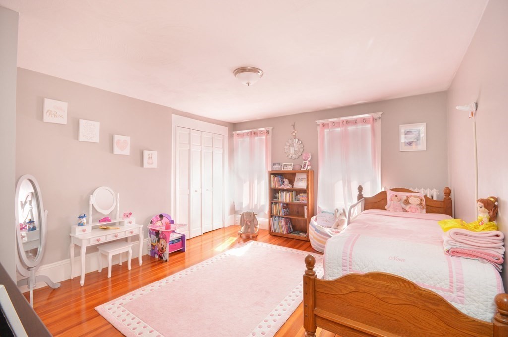 183 Cottage Park Road Winthrop, MA 02152 - Photo 26 of 35 a living room with furniture a rug and a window