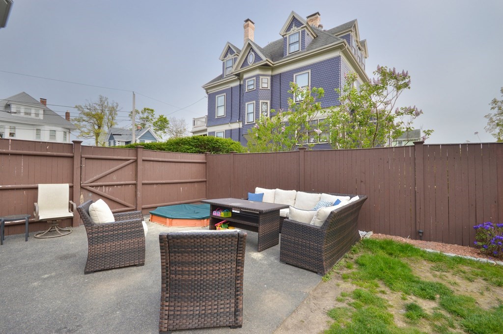 183 Cottage Park Road Winthrop, MA 02152 - Photo 32 of 35 a backyard of a house with seating space