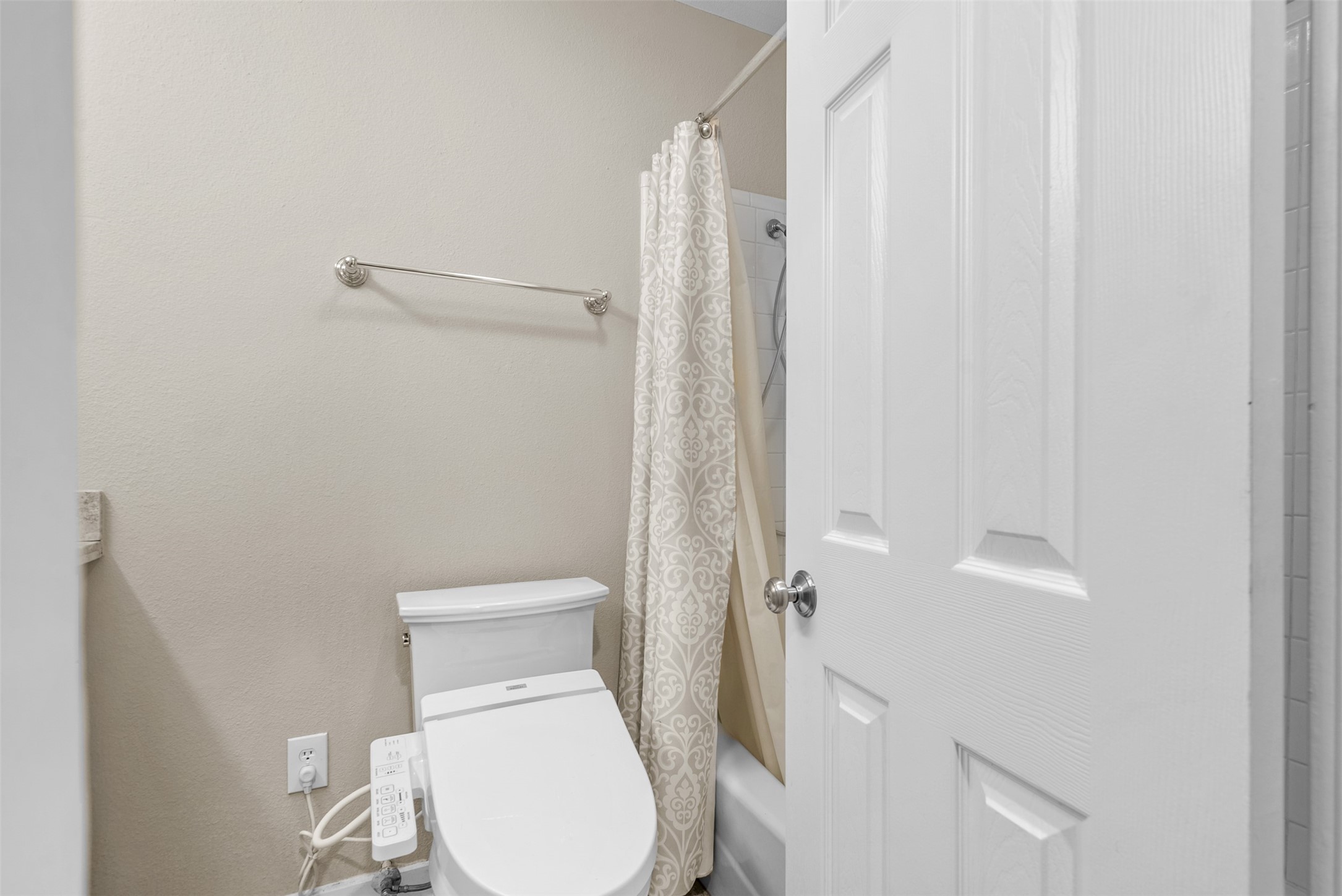 161 Litchfield Lane Houston, TX 77024 - Photo 26 of 30 a white toilet sitting next to a shower