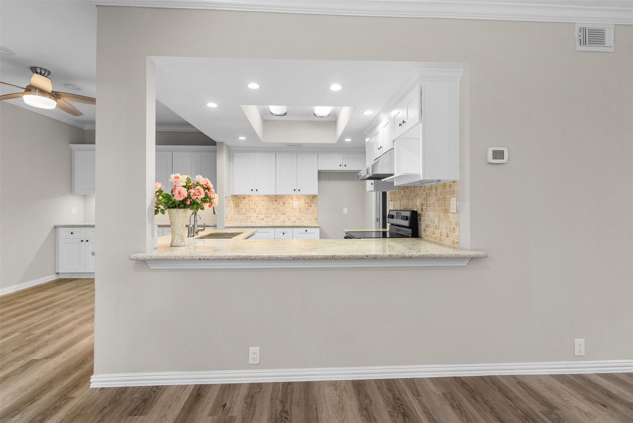 161 Litchfield Lane Houston, TX 77024 - Photo 8 of 30 a view of kitchen with wooden floor