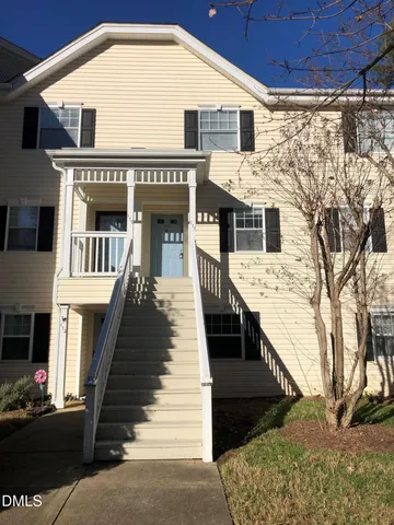 a front view of a house with a porch