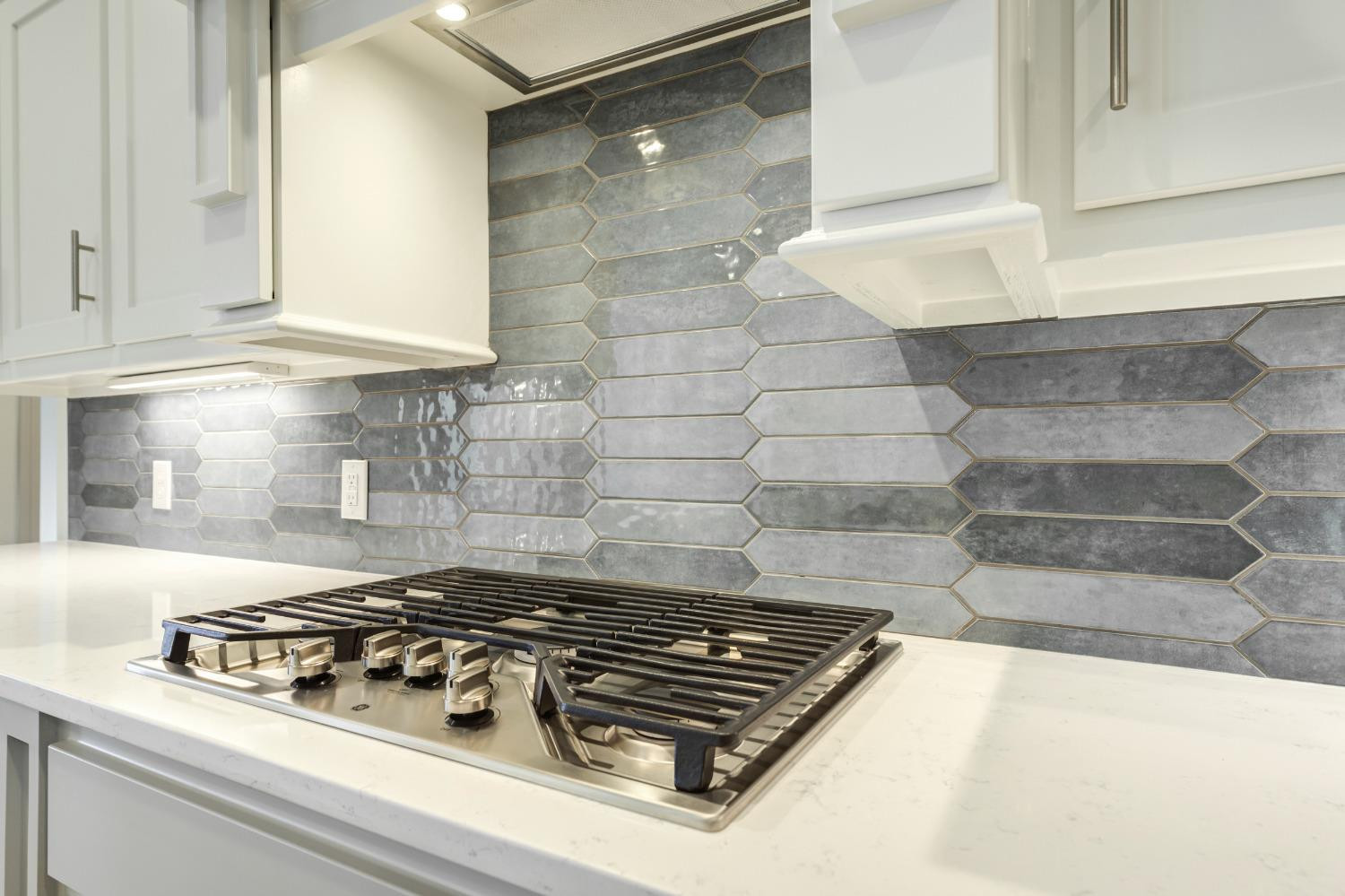 4608 140th Street Lubbock, TX 79424 - Photo 19 of 49 a stove top oven sitting inside of a kitchen