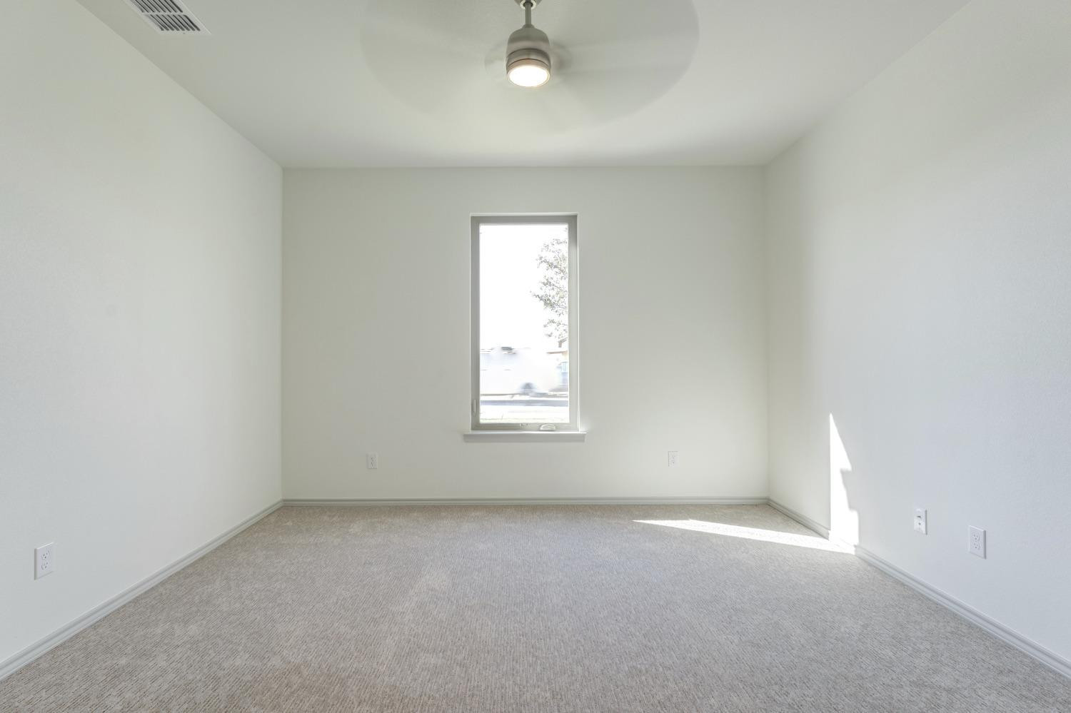 4608 140th Street Lubbock, TX 79424 - Photo 27 of 49 an empty room with a window