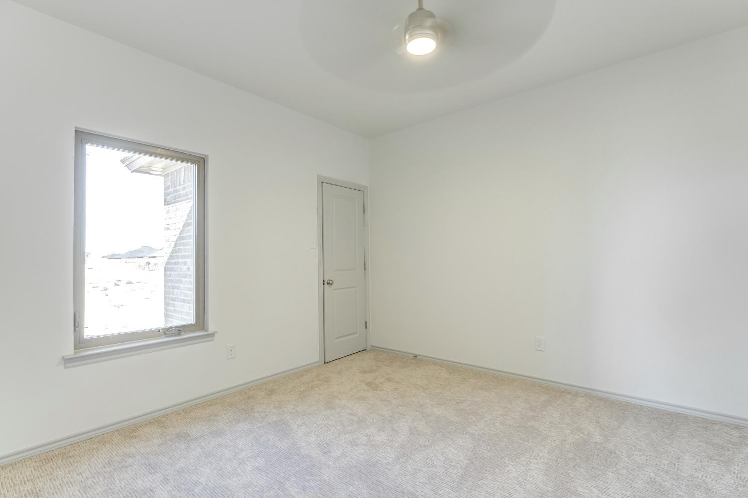 4608 140th Street Lubbock, TX 79424 - Photo 31 of 49 an empty room with windows