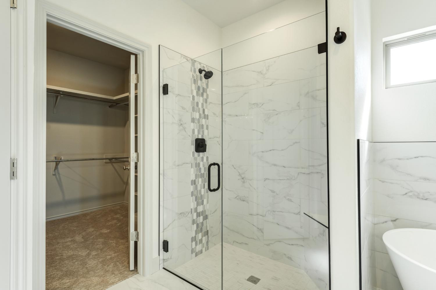 4608 140th Street Lubbock, TX 79424 - Photo 43 of 49 a bathroom with a shower and a toilet