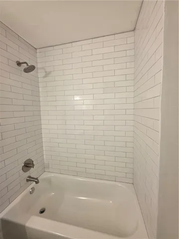 a bathroom with a bathtub