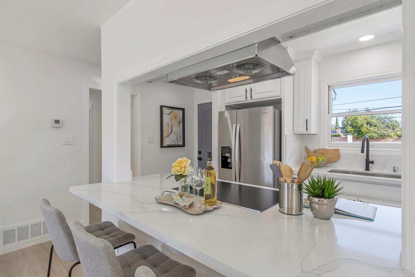 6722 Bollinger Road San Jose, CA 95129 - Photo 11 of 33 a dining room with furniture and potted plant