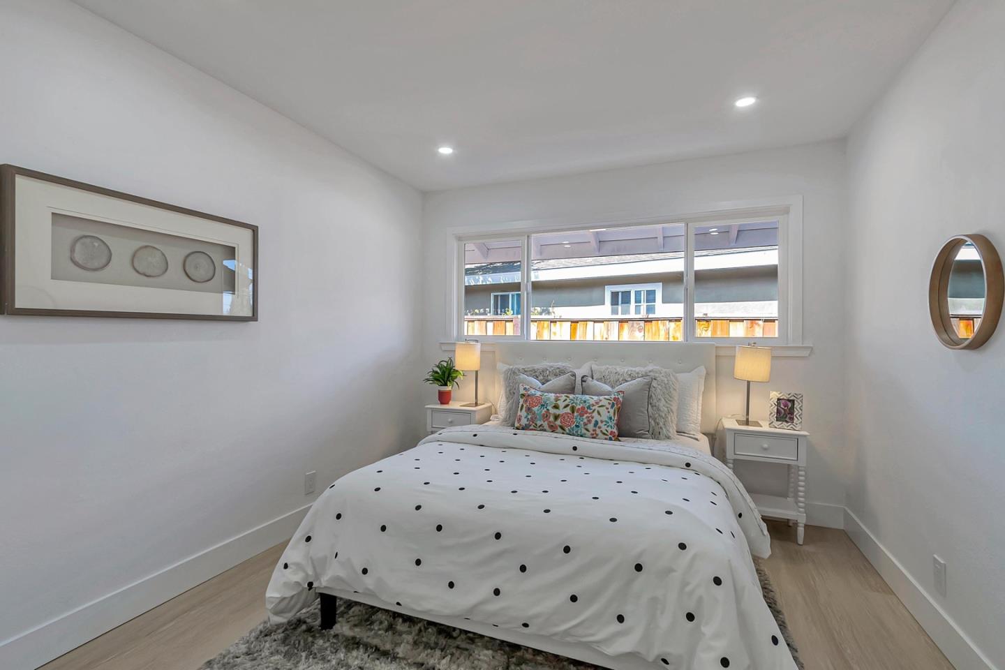 6722 Bollinger Road San Jose, CA 95129 - Photo 19 of 33 a bedroom with a bed and window