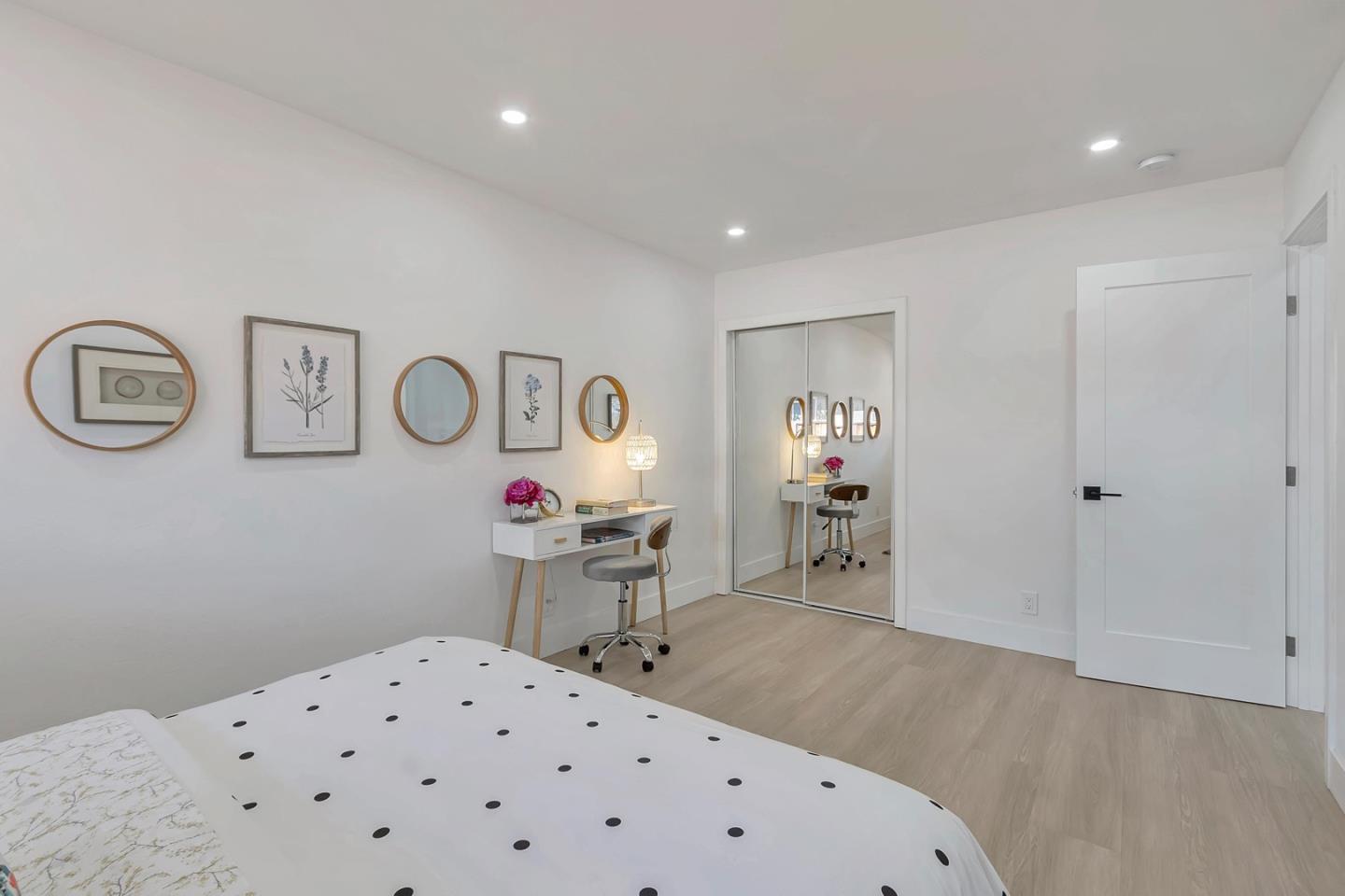 6722 Bollinger Road San Jose, CA 95129 - Photo 20 of 33 a bedroom with a bed and a table