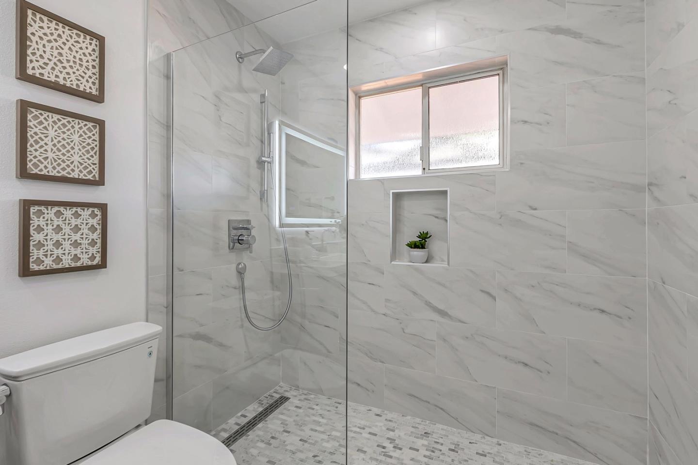 6722 Bollinger Road San Jose, CA 95129 - Photo 25 of 33 a bathroom with a toilet and a shower