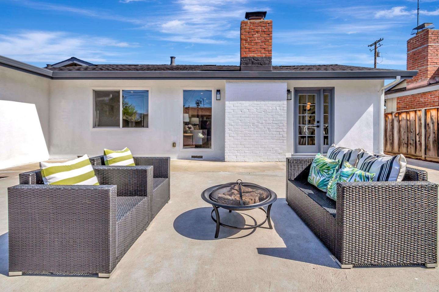 6722 Bollinger Road San Jose, CA 95129 - Photo 29 of 33 a living room with furniture and a rug