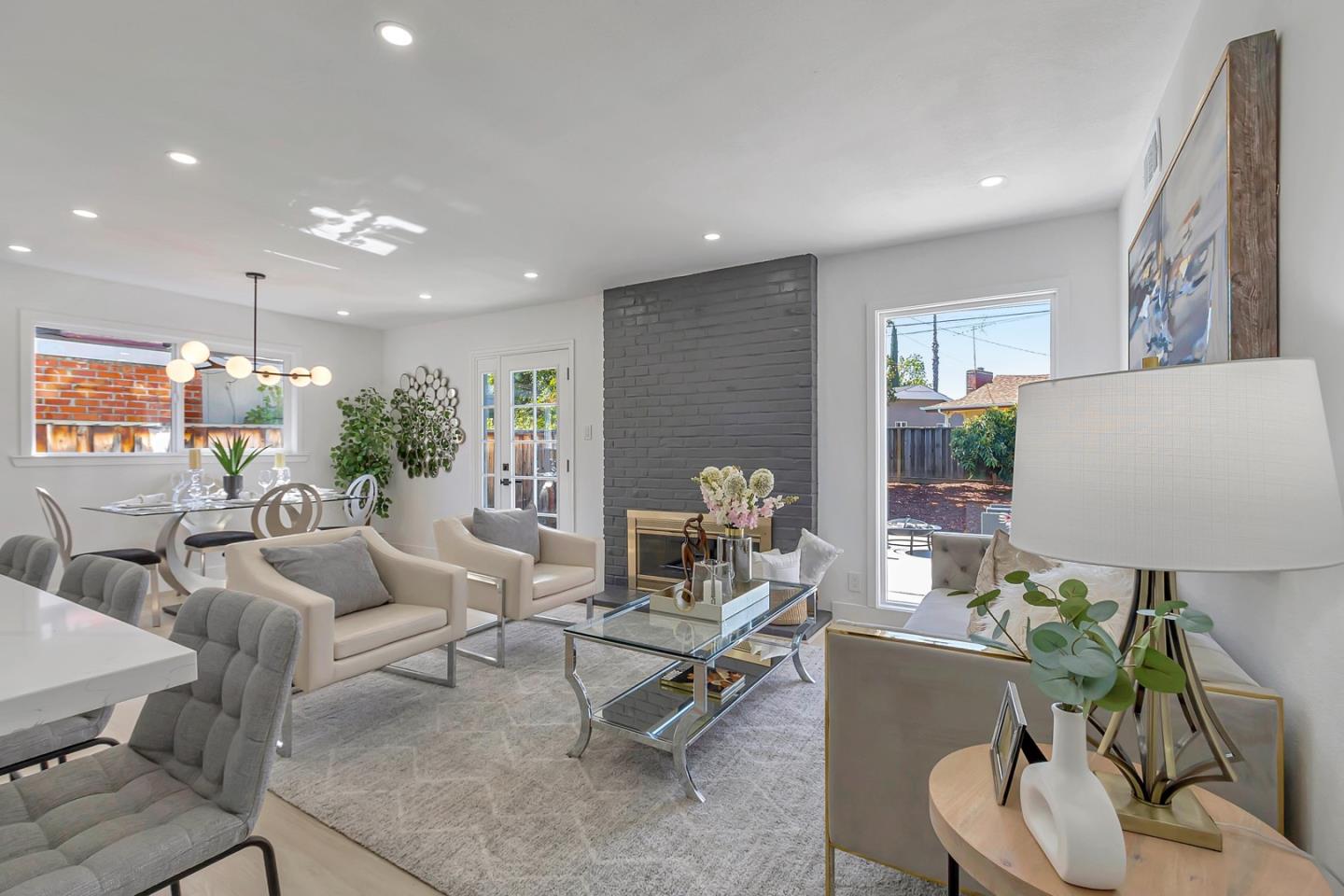 6722 Bollinger Road San Jose, CA 95129 - Photo 5 of 33 a living room with furniture and a potted plant