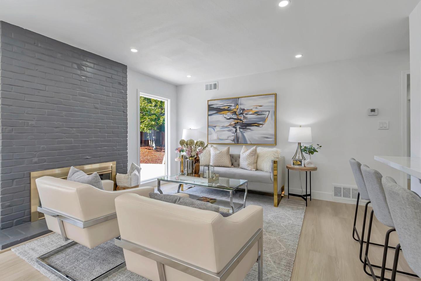 6722 Bollinger Road San Jose, CA 95129 - Photo 7 of 33 a living room with furniture and a painting on the wall